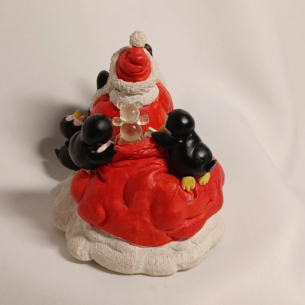 House of Lloyd Penguin Santa Figurine Music Box Plays Let it Snow  Works Great!!